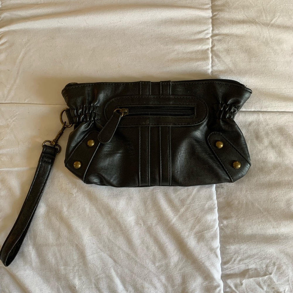 Kirra black wristlet with small outer pocket.